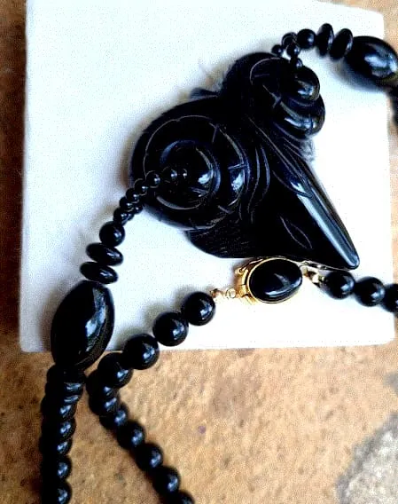 Black onyx necklace with carved pendant