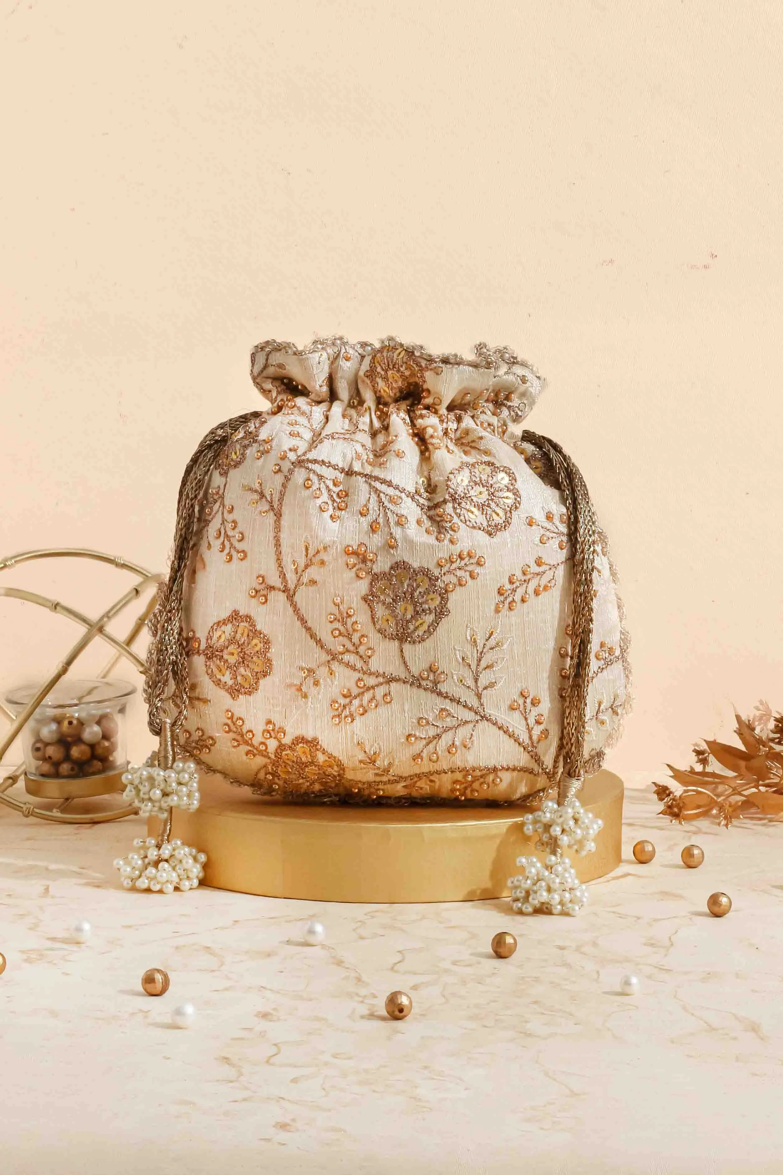 Cream embroidered scallop potli bag