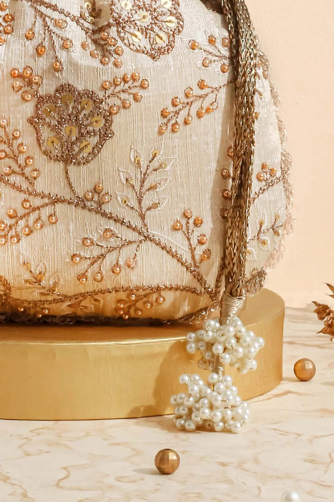 Cream embroidered scallop potli bag