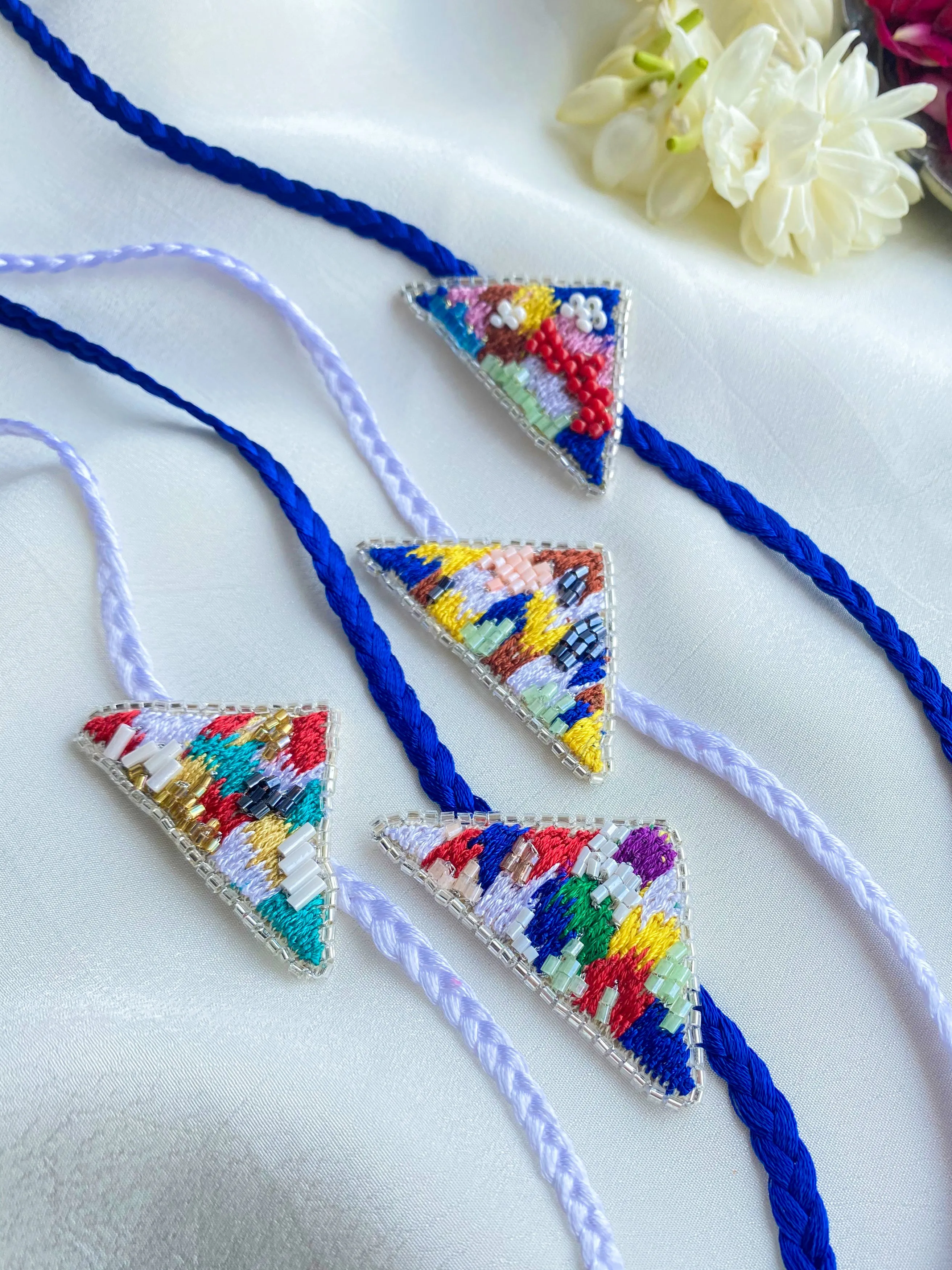 Kaleidoscope Embroidered Rakhi - Set of 4